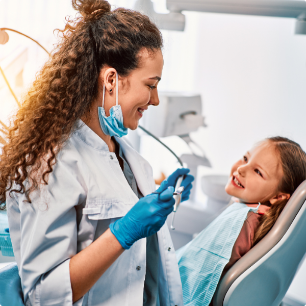 woman dentist and kid